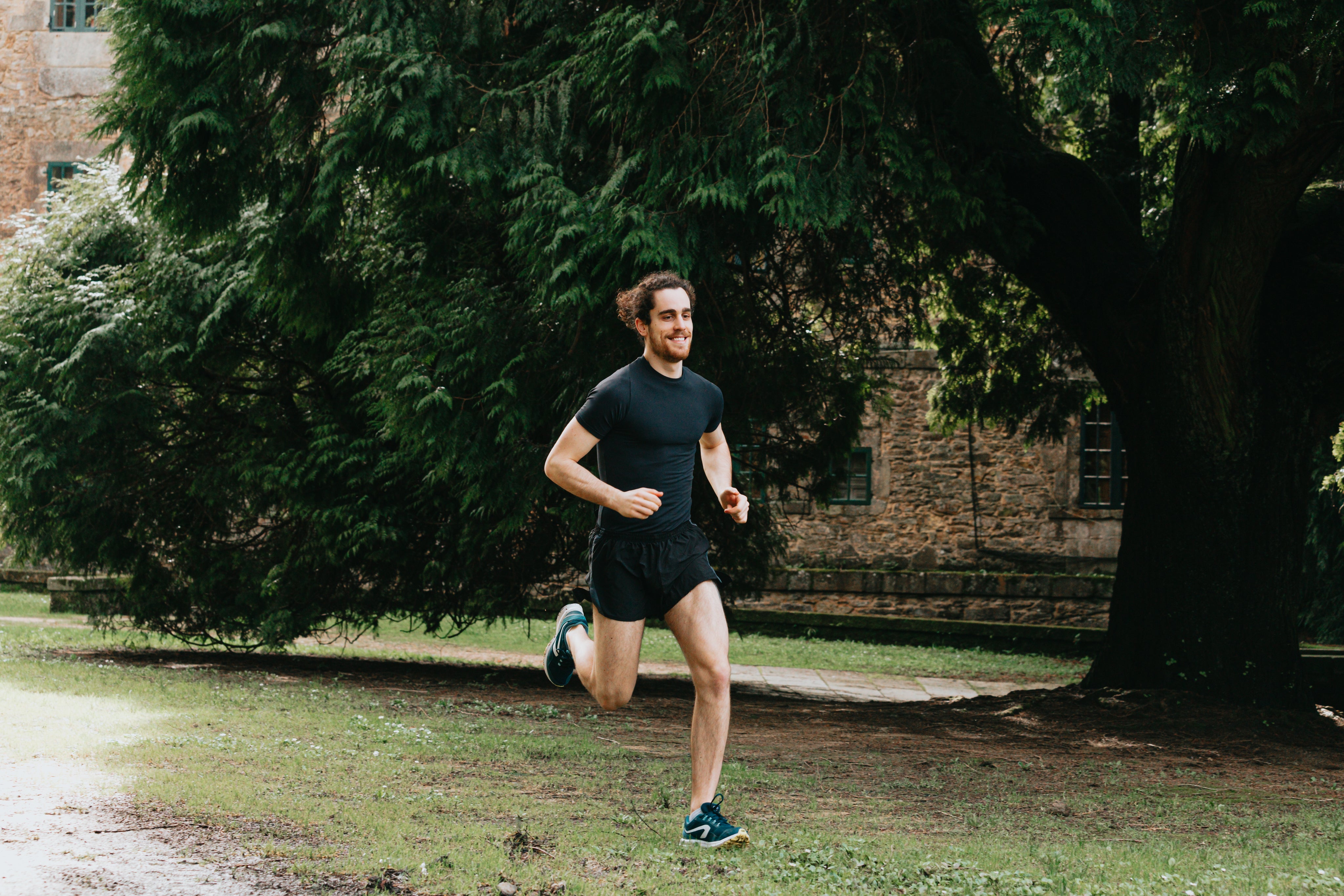 files/man-smiles-while-out-on-a-run-in-nature.jpg